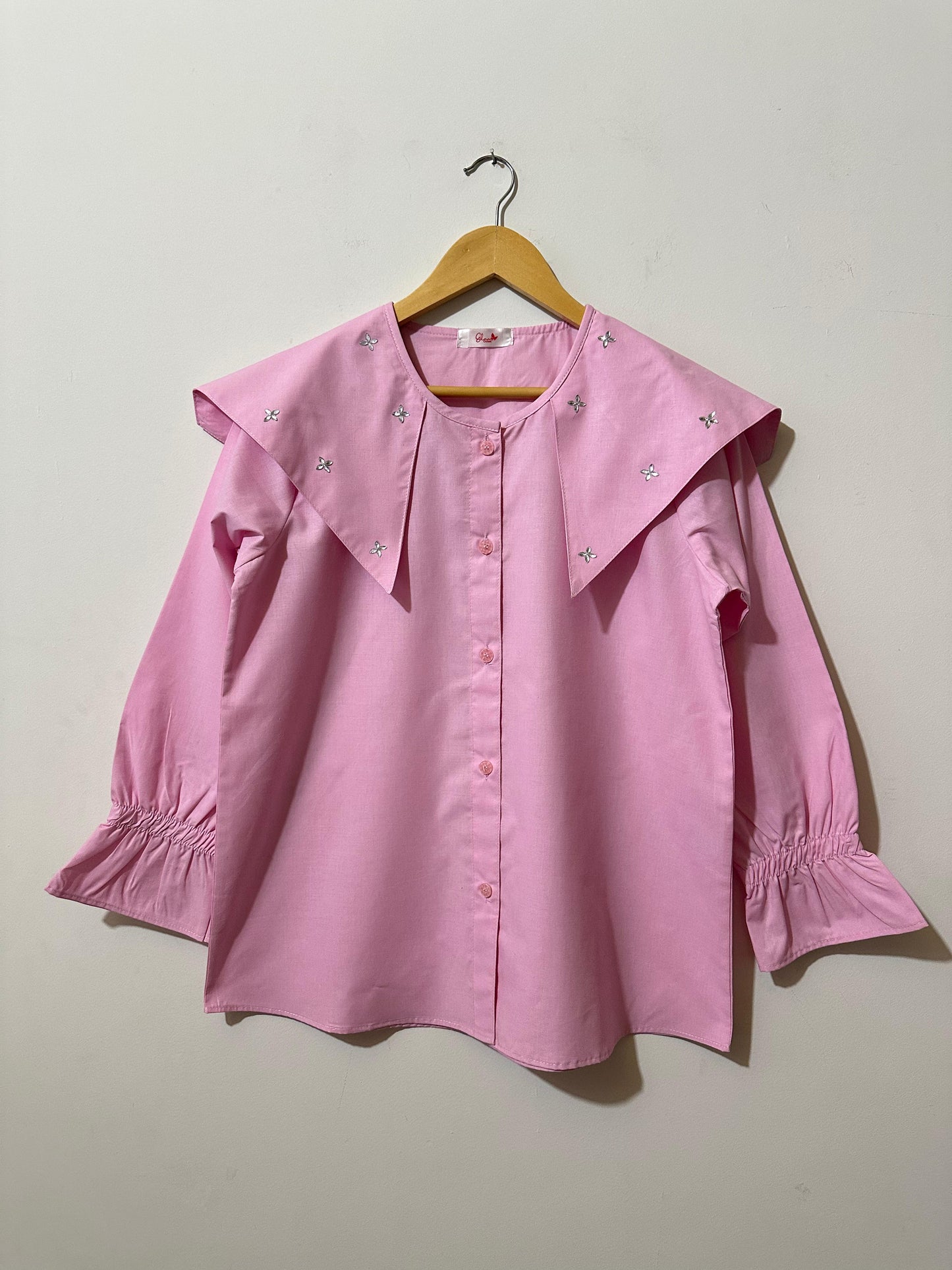 Pink Top with Ruffled Cuffs